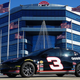 Image for article titled How A NASCAR Fan Got Sponsors To Buy Him A Tesla Model 3 With A Dale Earnhardt Tribute